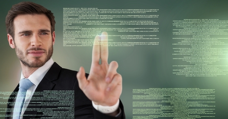 Digital composite of Businessman touching screen text interfaceの写真素材