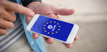 European locked GDPR against midsection of man using phoneの写真素材