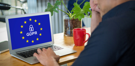 European Union locked against business executive using laptop