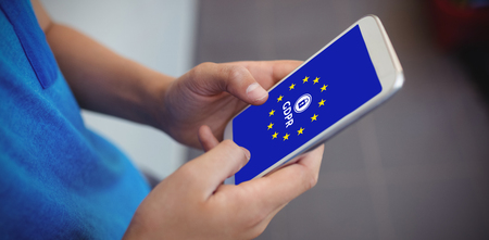 European Union locked against schoolboy using mobile phone in corridor at school
