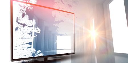 Blank computer monitor against digitally generated roomの写真素材