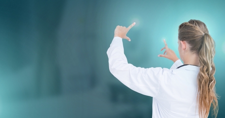 Digital composite of Female doctor interacting with air touchの写真素材