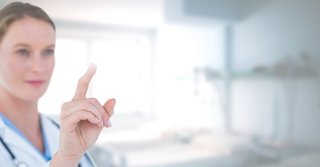 Digital composite of Female doctor interacting with air touchの写真素材