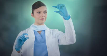 Digital composite of Female doctor interacting with air touchの写真素材