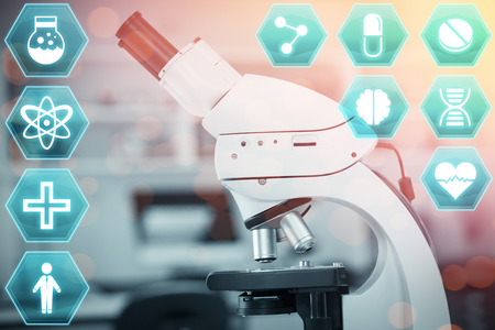 Medecine against microscope in laboratoryの写真素材