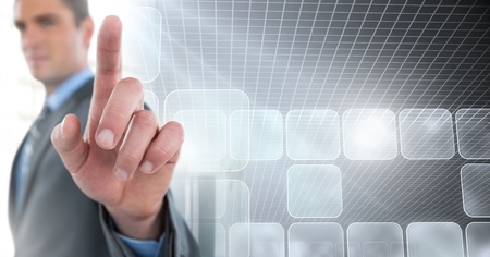 Digital composite of Man touching air with futuristic panels