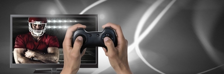 Digital composite of Playing American football computer game with controller in hands