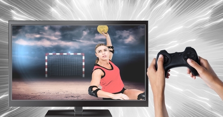 Digital composite of Hands holding gaming controller  with handball player on television
