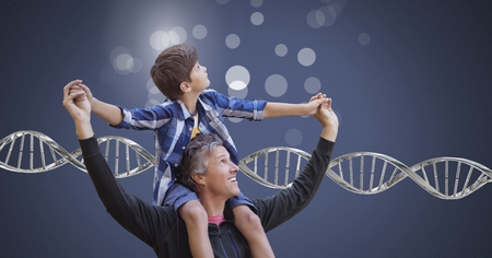 Digital composite of Father and son with sparkles and genetic DNAの写真素材