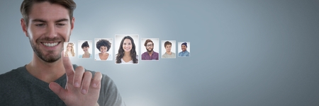 Digital composite of Man touching portrait profiles of different peopleの写真素材