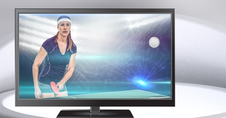 Digital composite of table tennis player on television