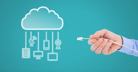 Digital composite of Hand holding wire connection with cloud devicesの写真素材