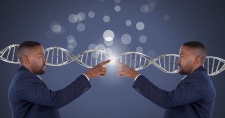 Digital composite of Clone twin man touching himself with genetic DNA and sparklesの写真素材
