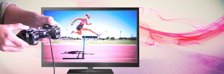 Digital composite of Hands holding gaming controller  with hurdle sports jumper on television
