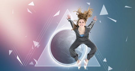 Digital composite of Cool young woman jumping with broken shapes over world