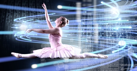 Digital composite of Ballet dancer dancing with digital technology interface and light glowingの写真素材