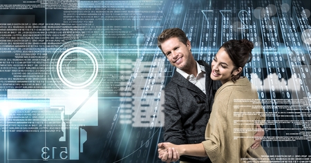 Digital composite of Couple dancing with digital technology interfaceの写真素材