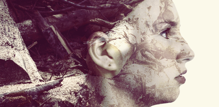 High angle view of fallen tree against teenage girl against white backgroundの写真素材