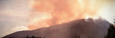 Beautiful mountains with clouds on a sunny dayの写真素材