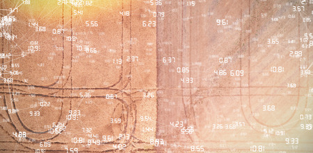 Screen with times against lines on harvested wheat fieldの写真素材