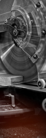 Grinder cutting machine cutting a piece of wood at workshopの写真素材