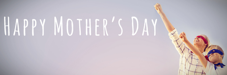 Digital composite of happy mothers day against white background against parent playing heroes with sonの写真素材