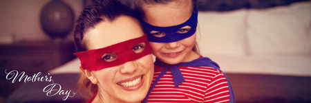 White background with text against one mother and her disguised daughterの写真素材