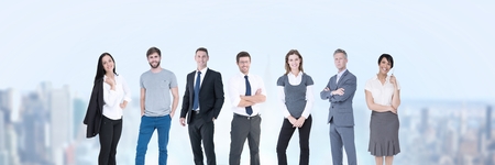 Digital composite of Business people and City buildings with flare light sourceの写真素材