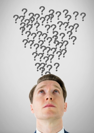 Digital composite of Man with grey question marks emerging from headの写真素材