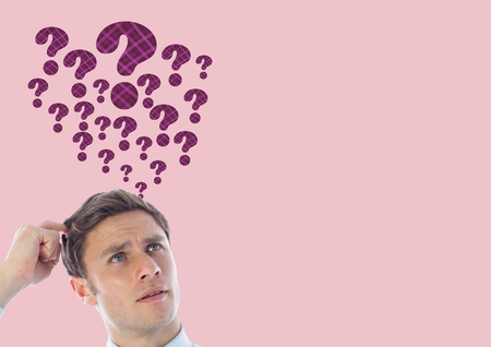 Digital composite of Man with thatched blue question marks emerging from headの写真素材