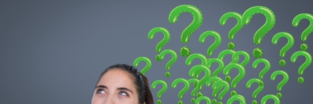 Digital composite of Woman with grey question marks emerging from headの写真素材