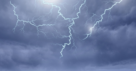 Digital composite of Lightning strikes in skyの写真素材