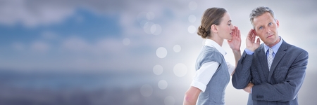 Digital composite of Business people and landscape with flare light sourceの写真素材