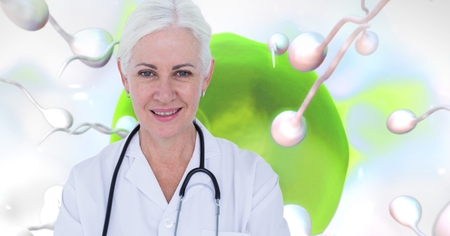 Digital composite of Doctor with sperm reproduction ovary for family planning