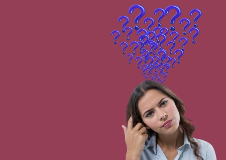 Digital composite of Woman with pink question marks emerging from headの写真素材