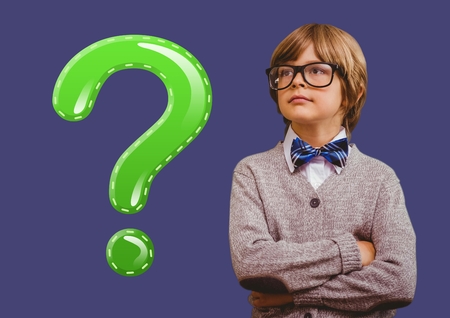 Digital composite of Kid Boy with green shiny question markの写真素材