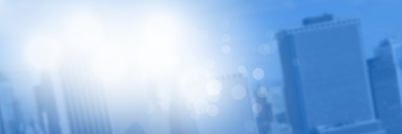 Digital composite of City buildings with flare light sourceの写真素材