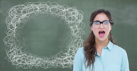 Digital composite of Woman shouting with squiggly doodle circle on blackboardの写真素材