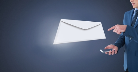Digital composite of Envelope letter messages and man using phoneの写真素材