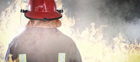 Back of Firefighter against grey room