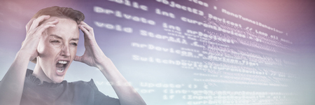 Business woman holding her head against purple and blue backgroundの写真素材