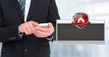 Digital composite of Firewall shield icon box and man using phone