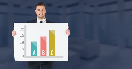 Digital composite of Statistic bar charts and man holding cardの写真素材