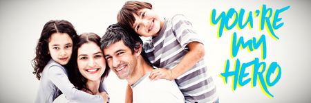 Smiling parents giving their children a piggyback ride  against close up of blue text you are my...