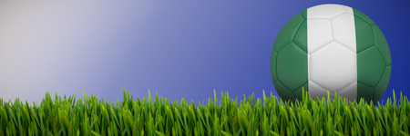 Grass growing outdoors against abstract blue backgroundの写真素材