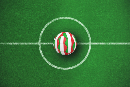 Football in italy colours against soccer field planの写真素材
