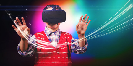 young boy in red jumper with virtual reality headset