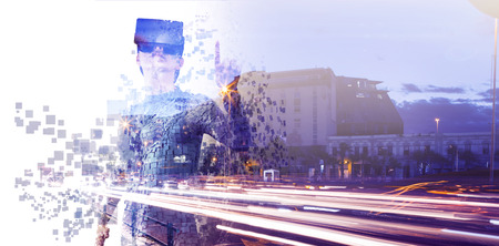 Digital composite of woman with an augmented reality simulator against full length of gray pixelated 3d womanの写真素材