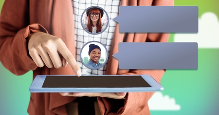 Digital composite of Hands using tablet with chat bubble messaging profile