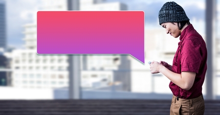 Digital composite of Man using phone with bright city background and chat bubbleの写真素材